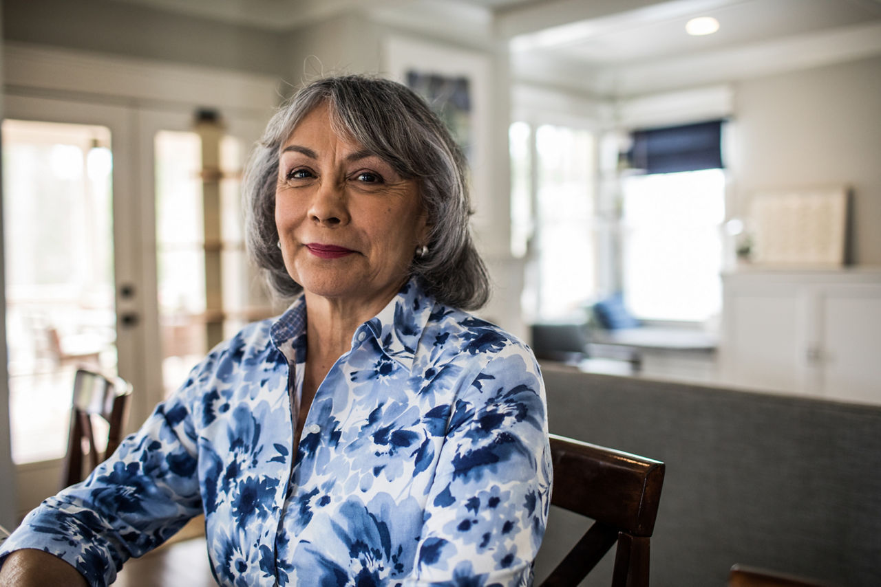 Portrait of senior woman sitting on porch