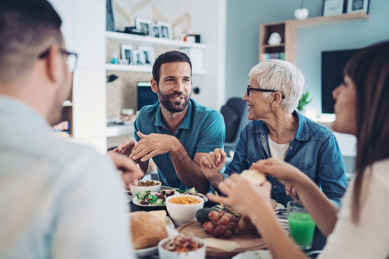 Multi-generation family eating together