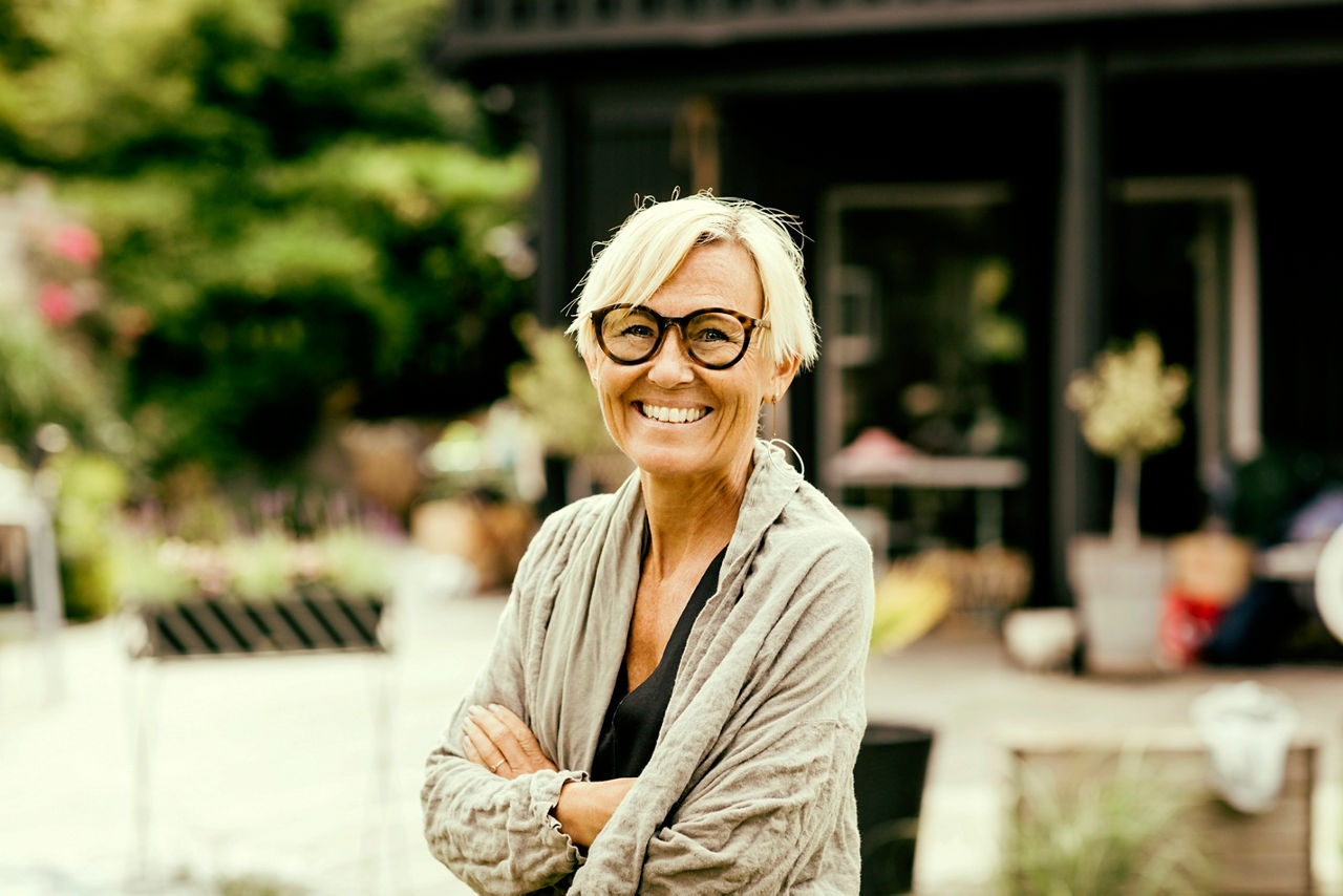 Woman in glasses smiling