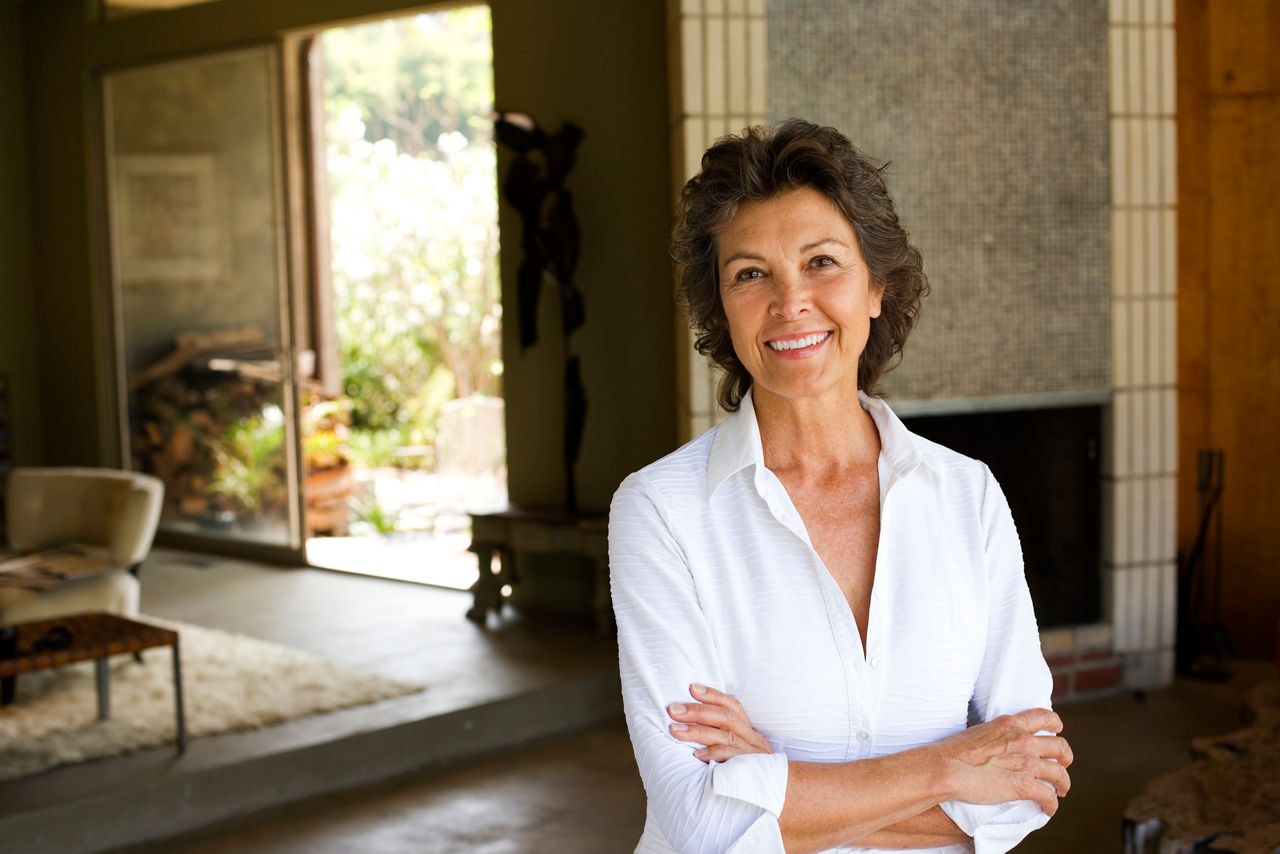Smiling woman wearing a white shirt