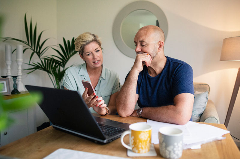 Couple looking at computer