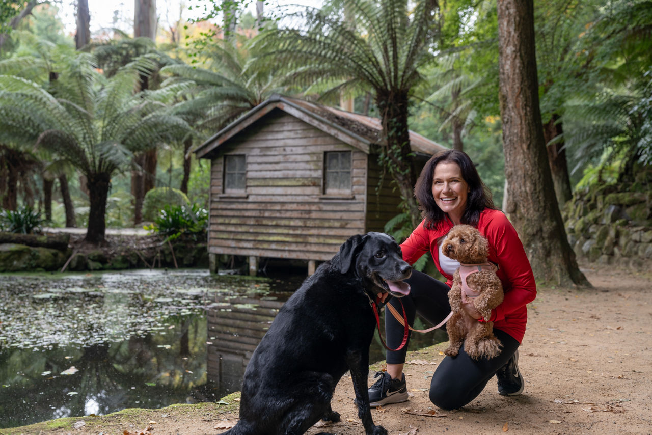 woman with her pet dogs