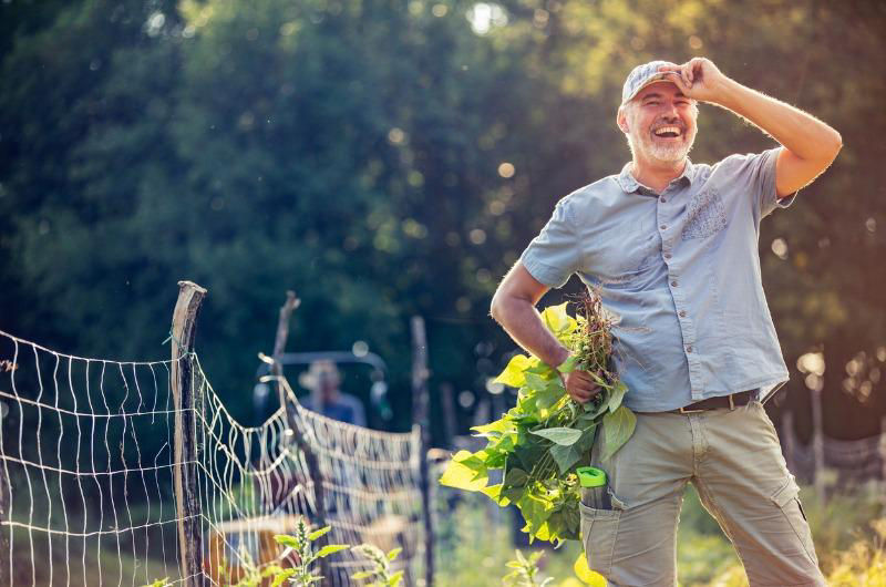 Happy man in garden 