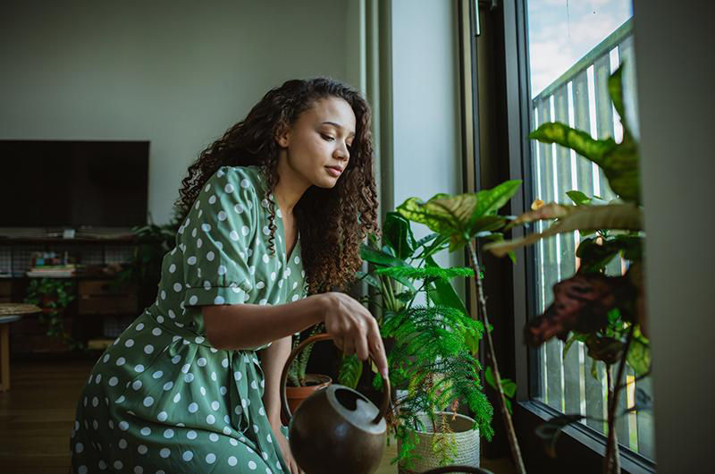 woman watering plants 