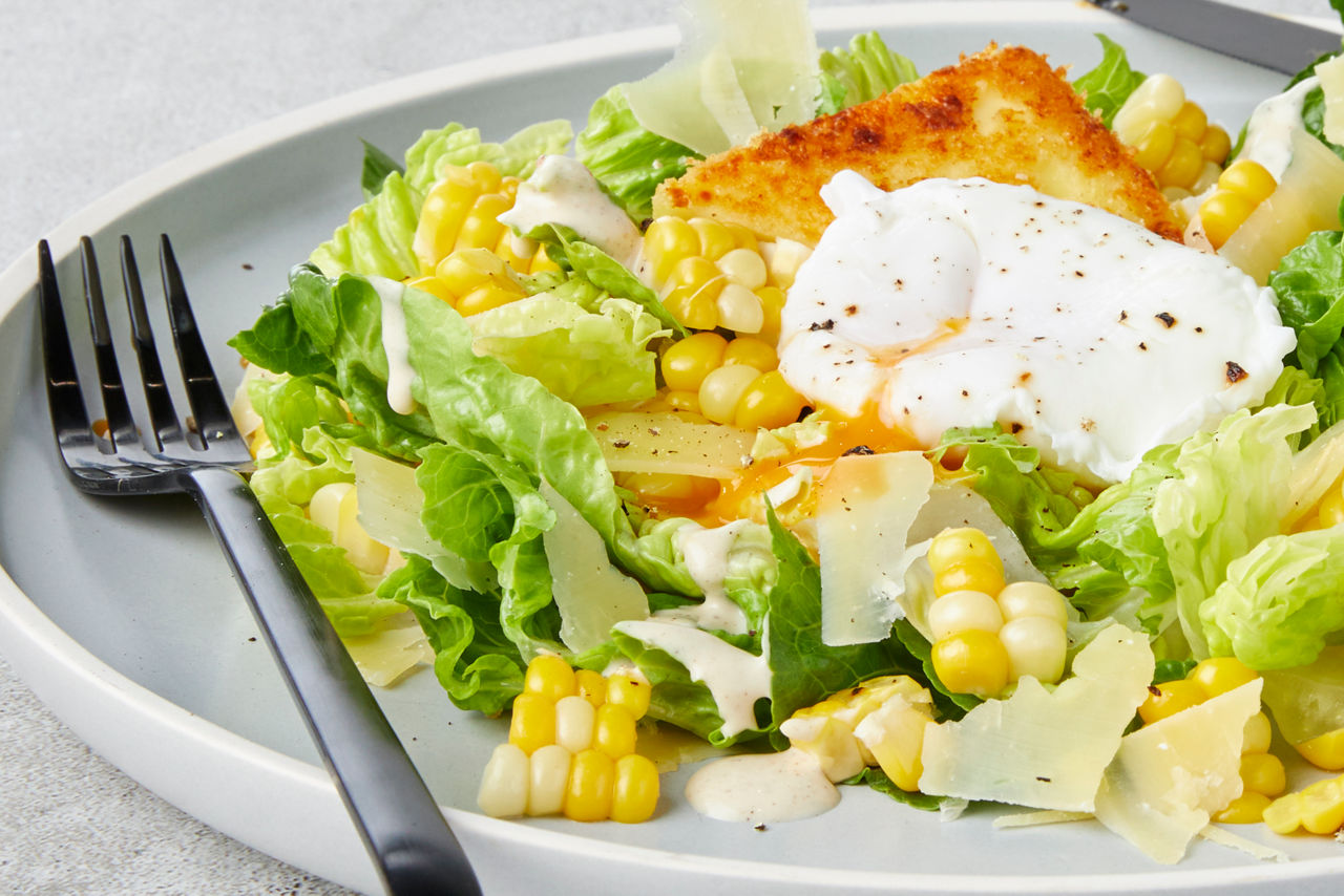 Photo of Crumbed Haloumi & Grilled Corn Caesar Salad
